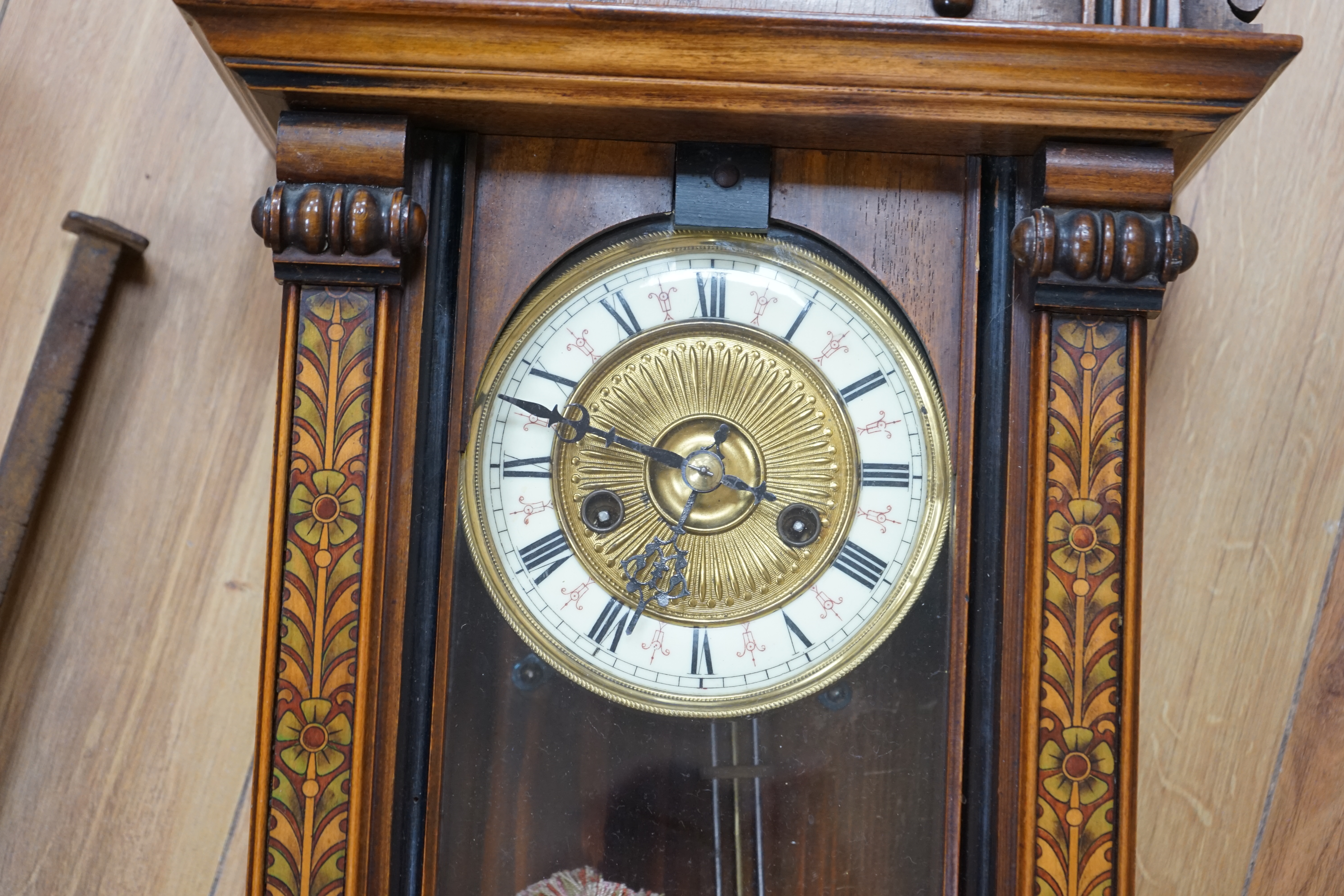 A Vienna style pen worked mahogany wall clock, 61cm. Condition - fair, bottom finial missing, not tested as working